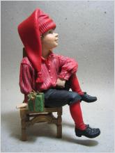 Figurin Julgosse sittande på stol - Candy Design Norway
