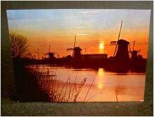 Vykort -  Väderkvarn i solnedgång - Molenland - Holland