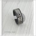 Tufft m�nstrad ring i stainless steel! L�gt pris! 21mm!