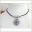 Keltiskt halsband, knut med blå kristall!