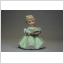 Figurin Söt Flicka med grön klänning i porslin