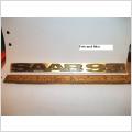 SAAB 99. Emblem. Tapparna på baksidan är hela