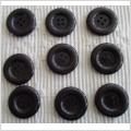 9 snygga blanka svarta 4 - håls knappar 27 mm.