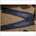 Mörkblå slim fit jeans st 38